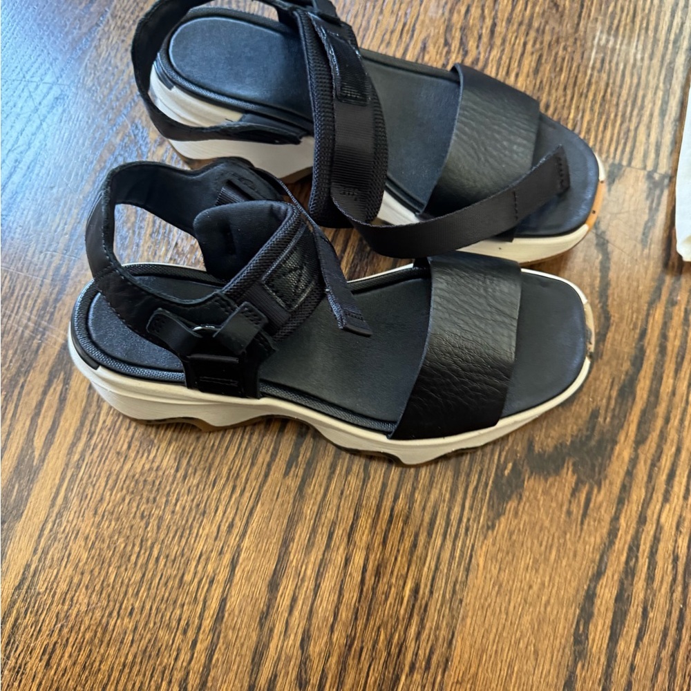 Kinetic impact high sandals by Korel